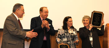 Monica receiving an award from MNYCSG in April 2008